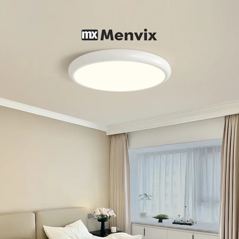 Ceiling light fixture with Menvix logo in a room setting