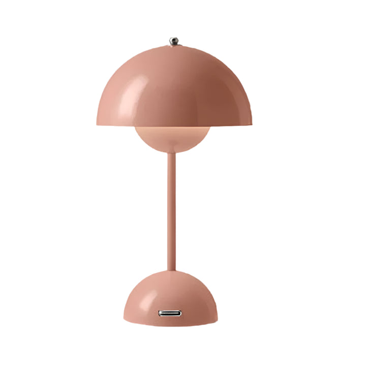 Pink table lamp with a white background