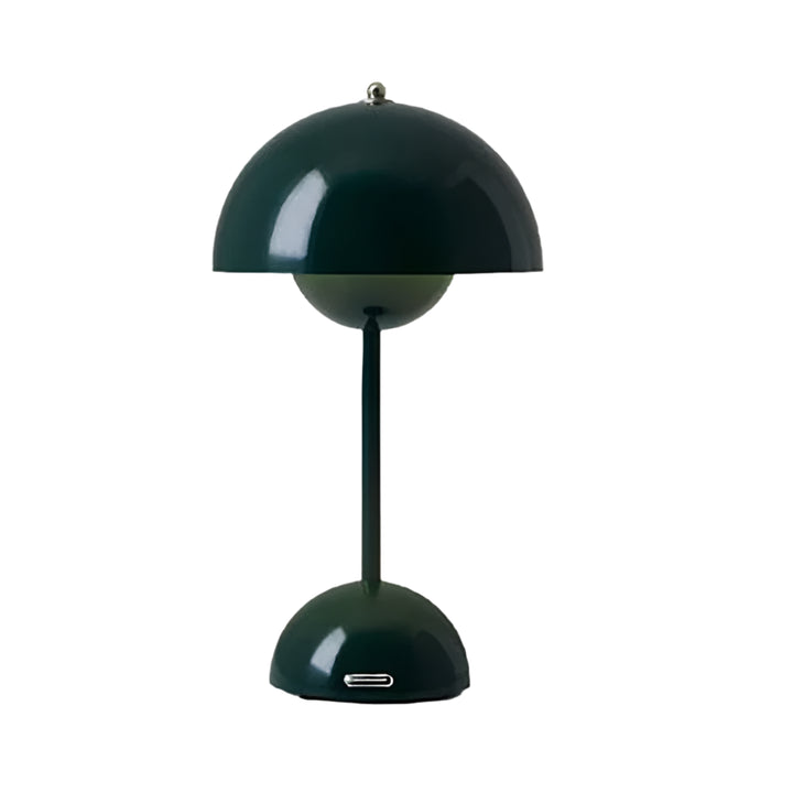 Green table lamp with a unique design on a white background